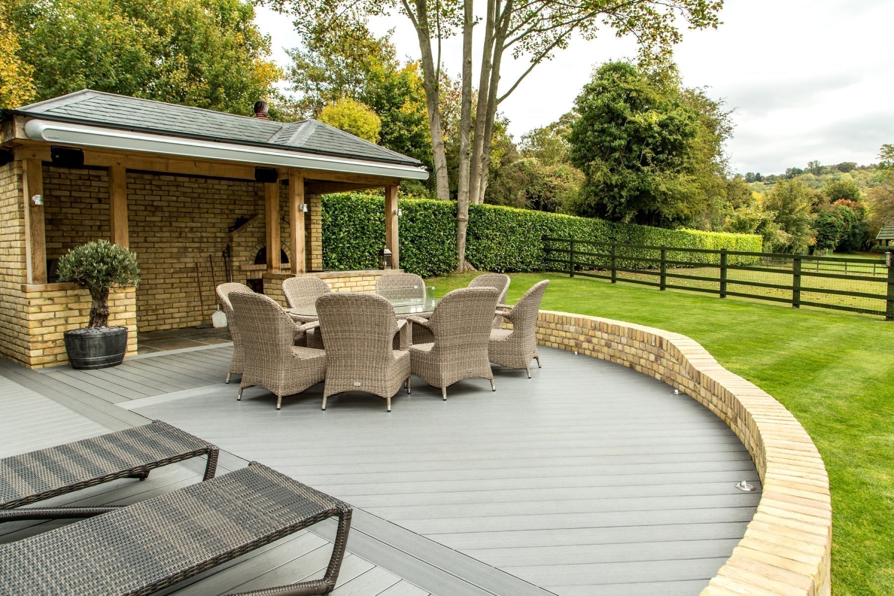 NeoTimber composite decking with seating overlooking garden.