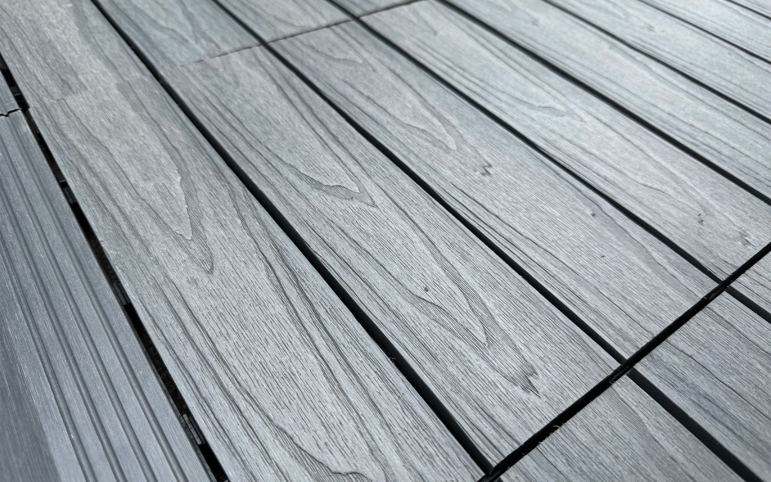 NeoTimber decking using composite deck tiles.