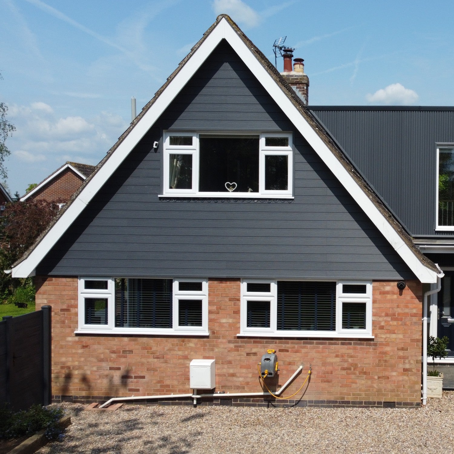 NeoTimber Deluxe Woodgrain Cladding Board - Grey Residential Project