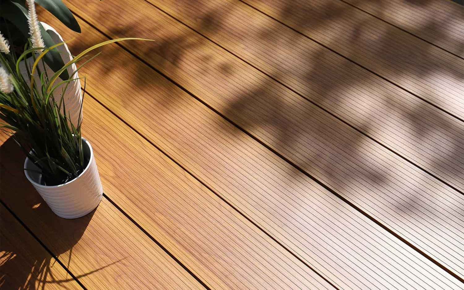 Aluminium decking with woodgrain finish.  