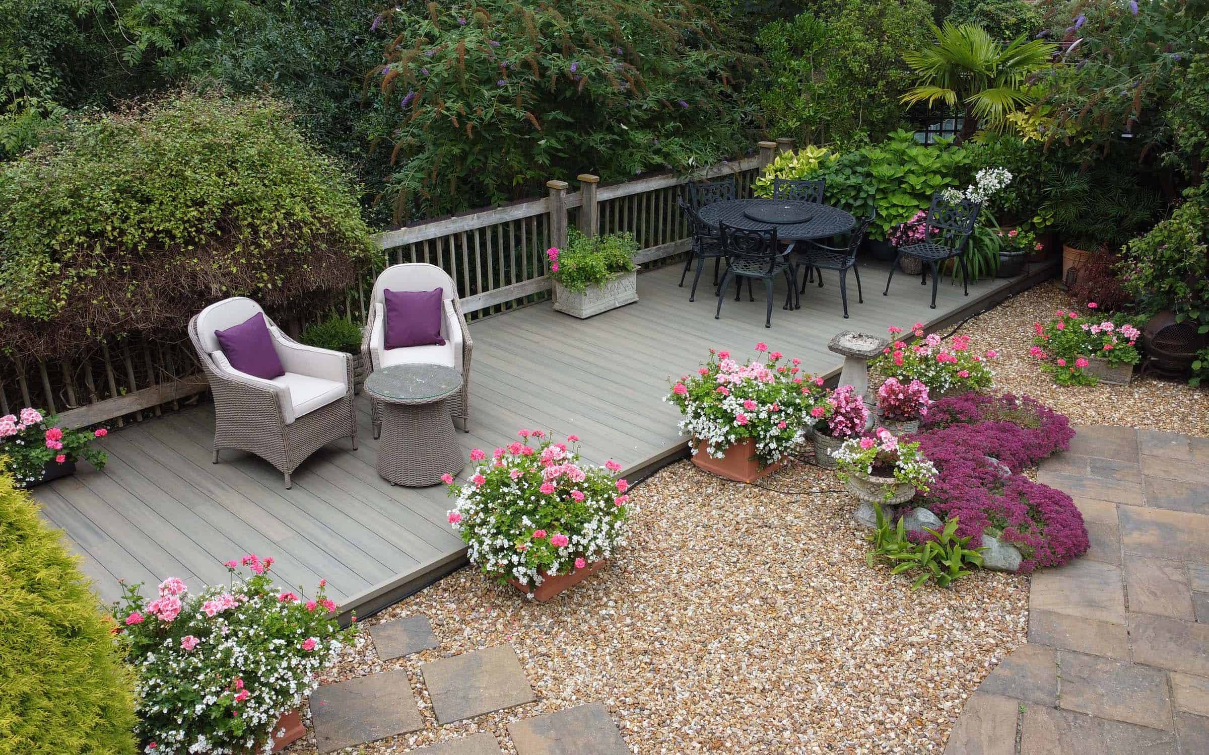 Beautiful decking area with flowers.  