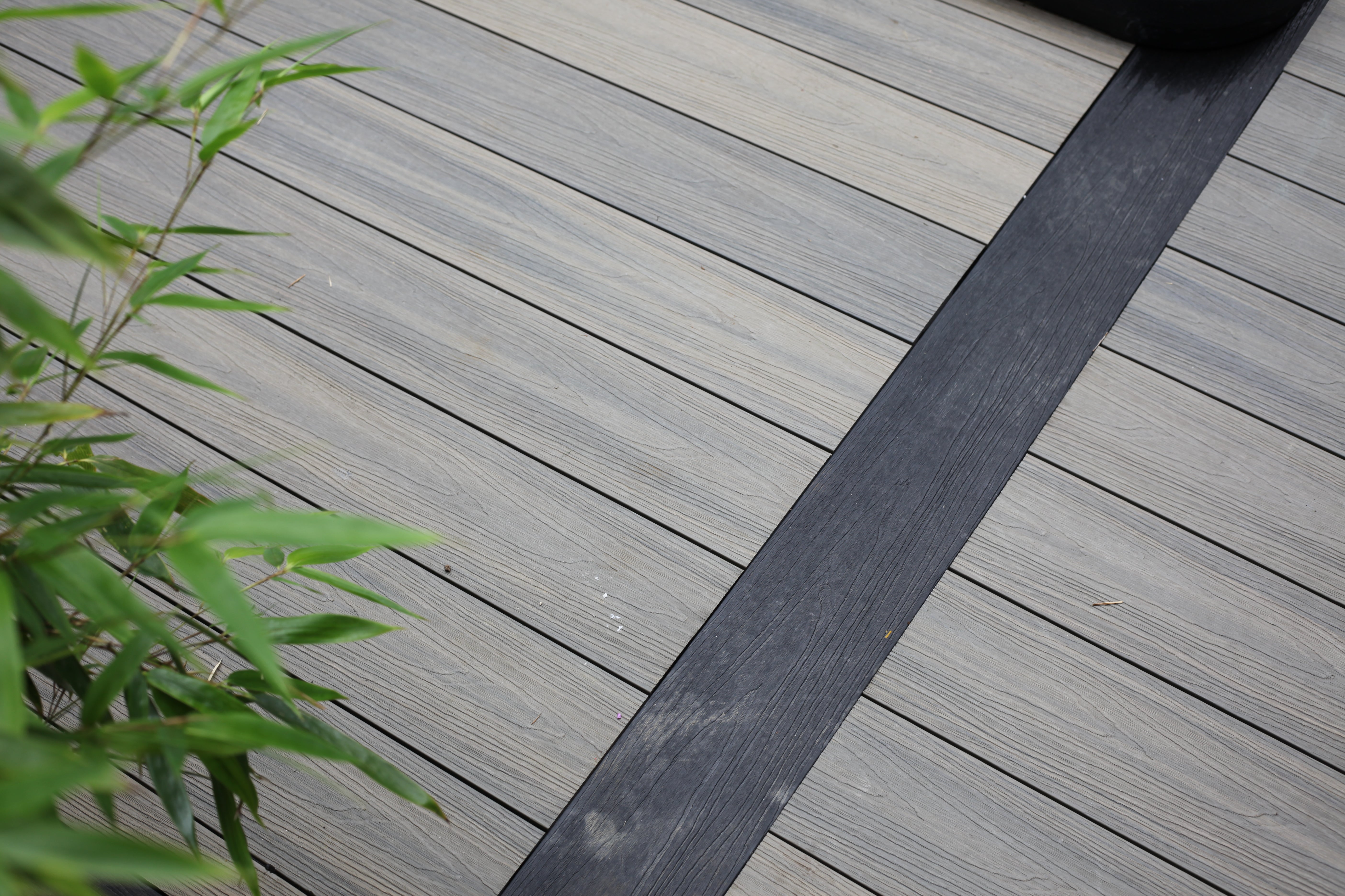 NeoTimber grey and charcoal composite deck boards.  