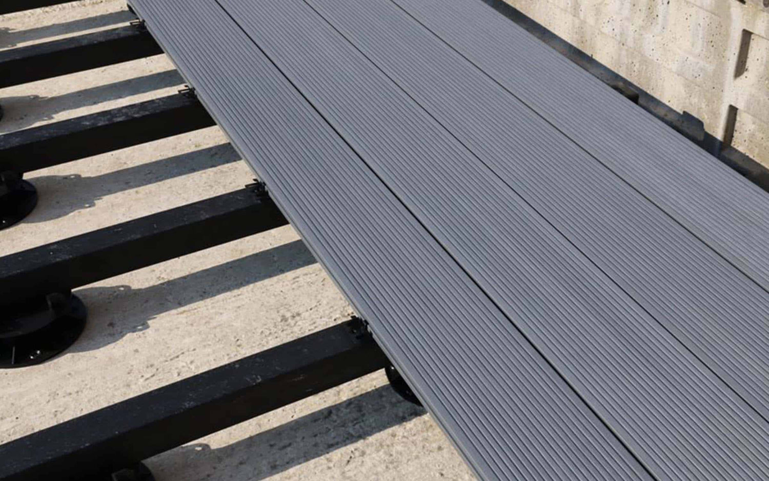 can you install composite decking over concrete
