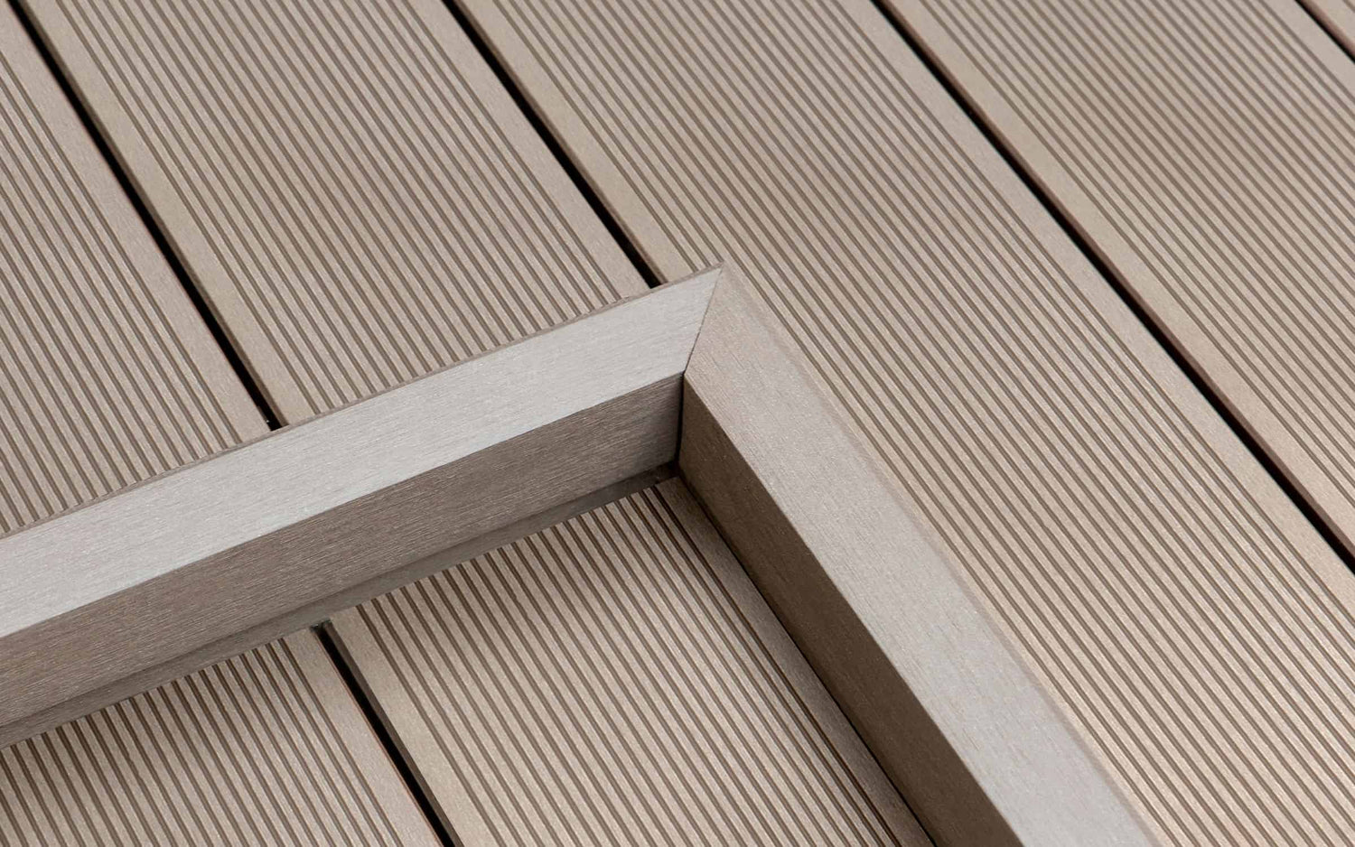 laying composite decking over wood