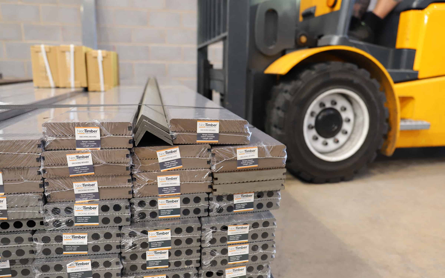 NeoTimber decking stacked in warehouse. 