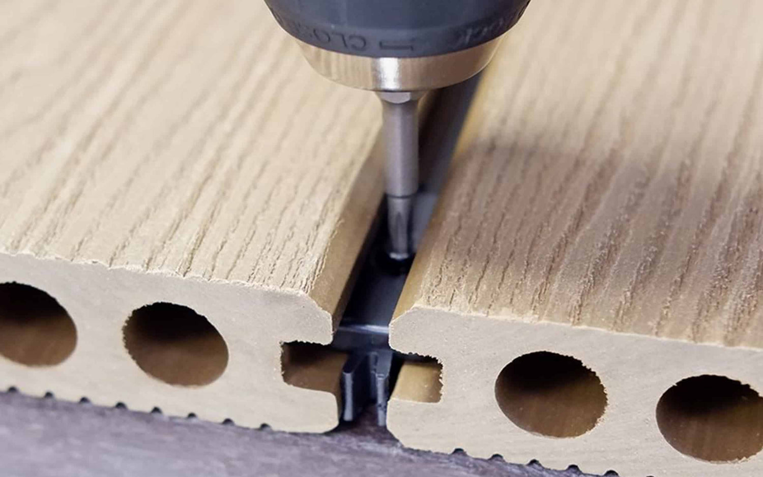 FastClip securing two decking boards. 