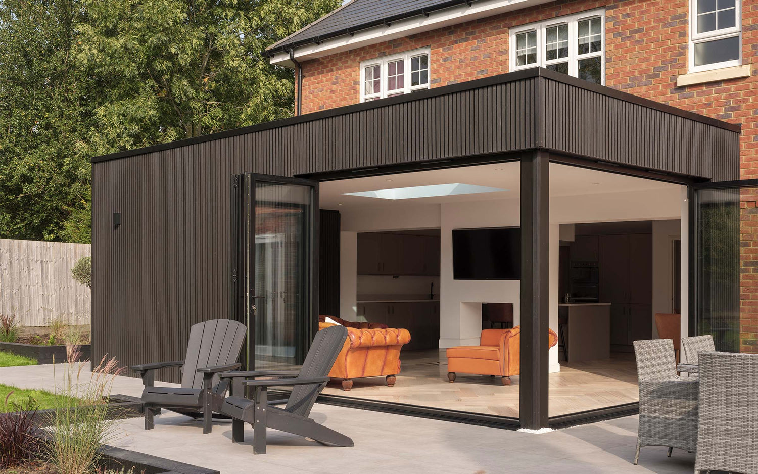 Slatted composite cladding
