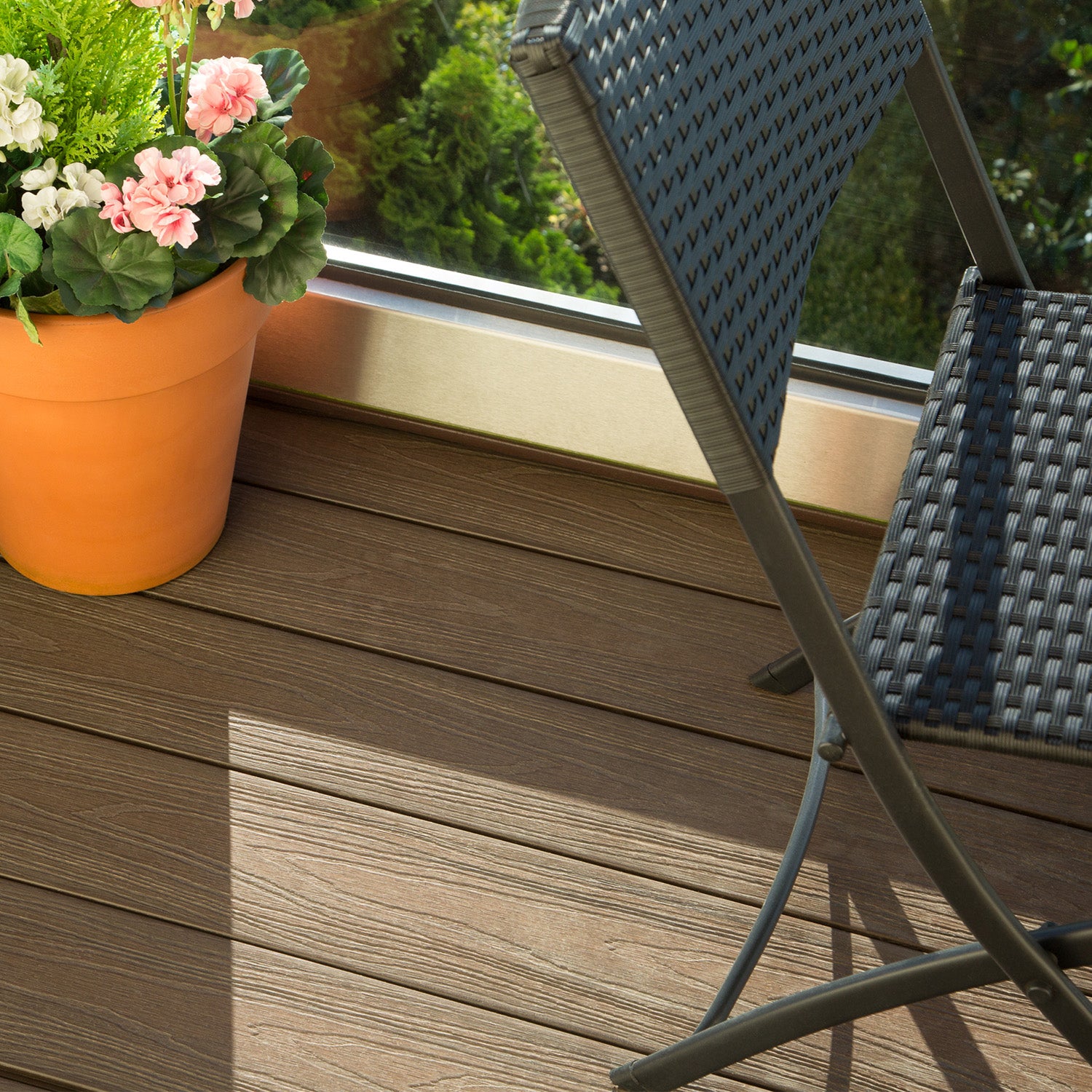 Composite Decking in sunny garden