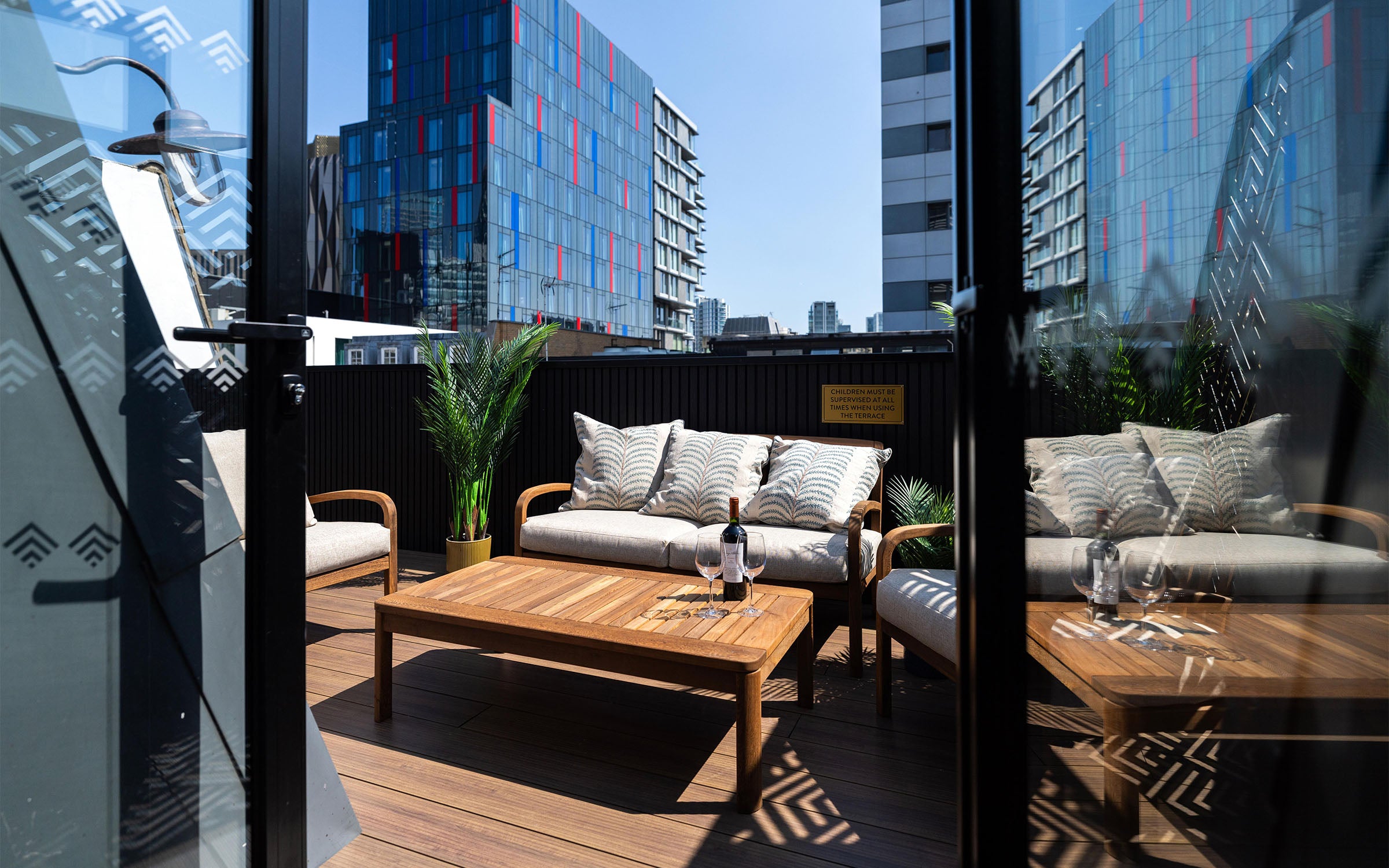 NeoTimber Woodgrain Effect Aluminium Deck Board - Fire-rated hotel balcony