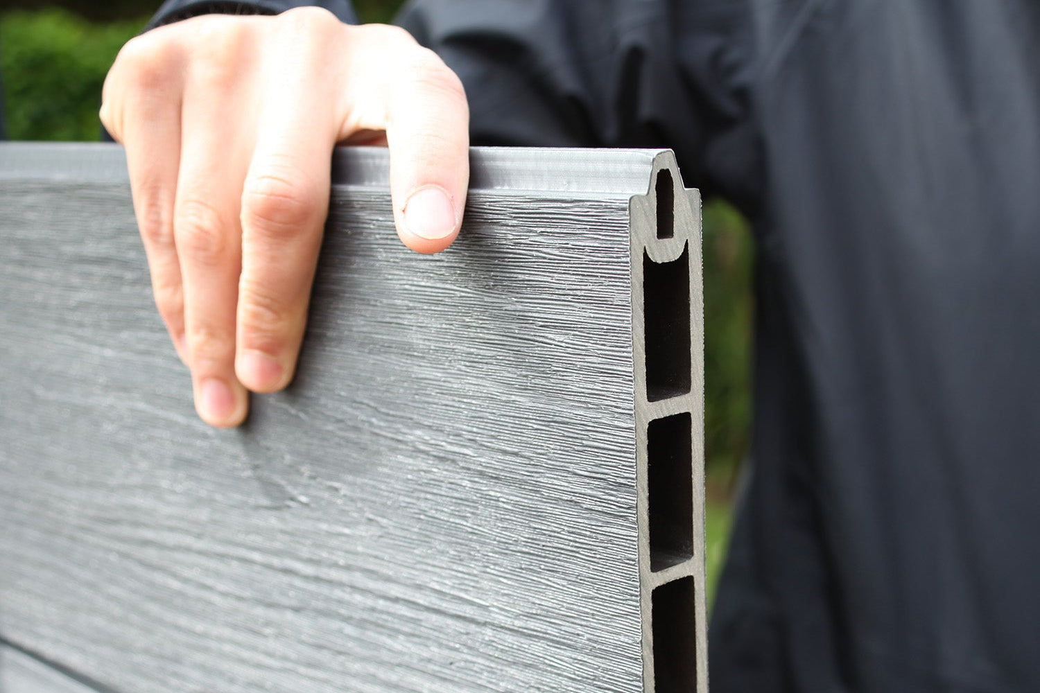 slotting a fence board into place