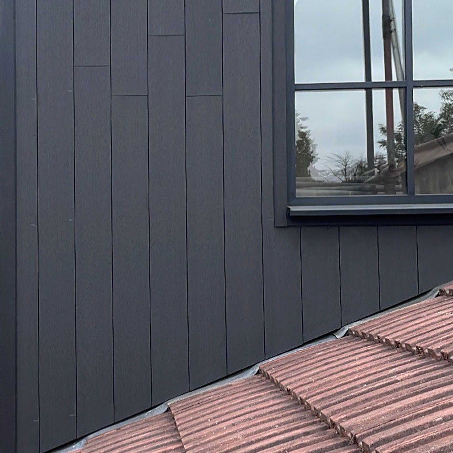 NeoTimber Deluxe Brushed Composite Cladding Board - Completed charcoal project