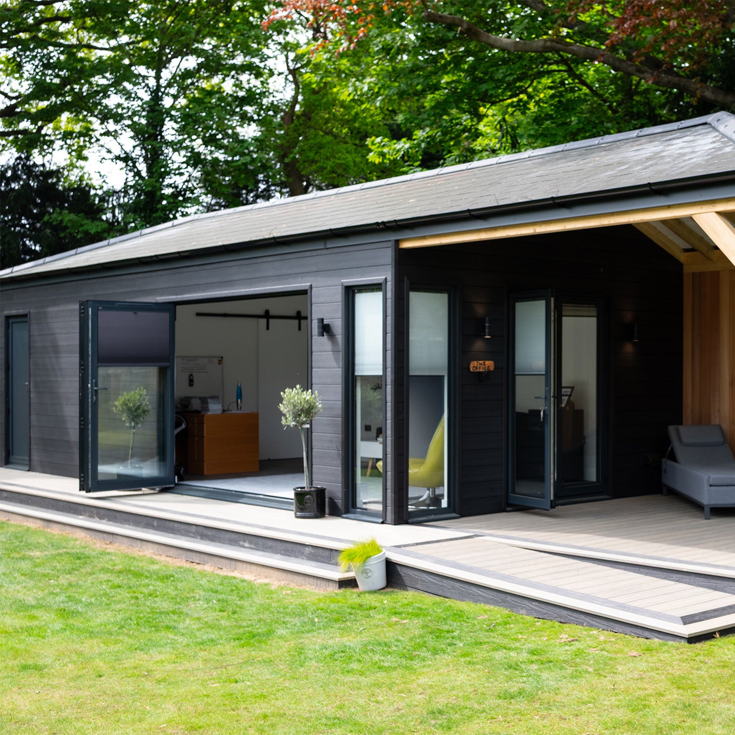 NeoTimber Deluxe Brushed Composite Cladding Board - Completed cabin in charcoal