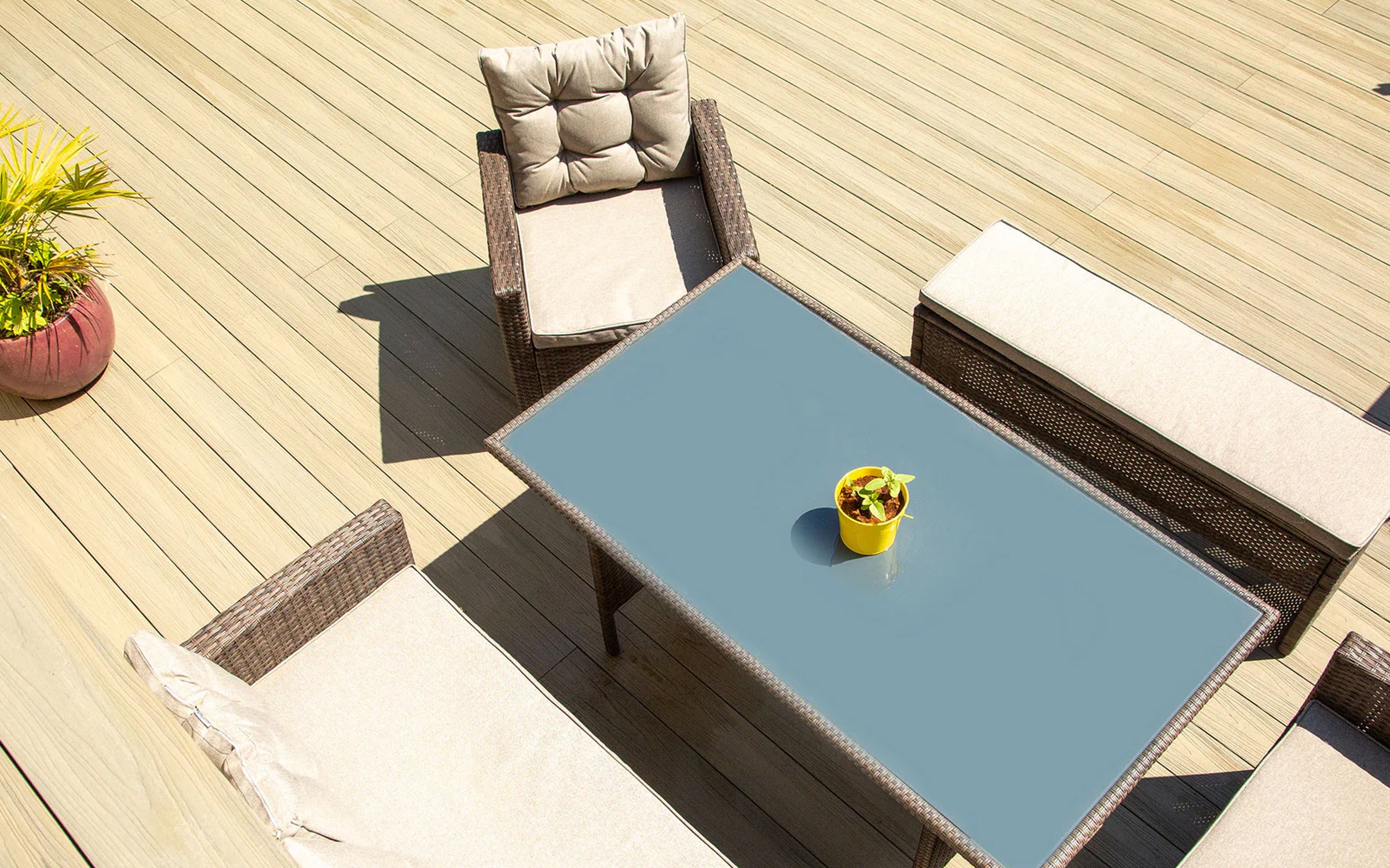 Outdoor dining area finished with NeoTimber decking, creating a stylish and practical entertaining space.